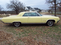 Image 2 of 5 of a 1964 OLDSMOBILE STAR FIRE