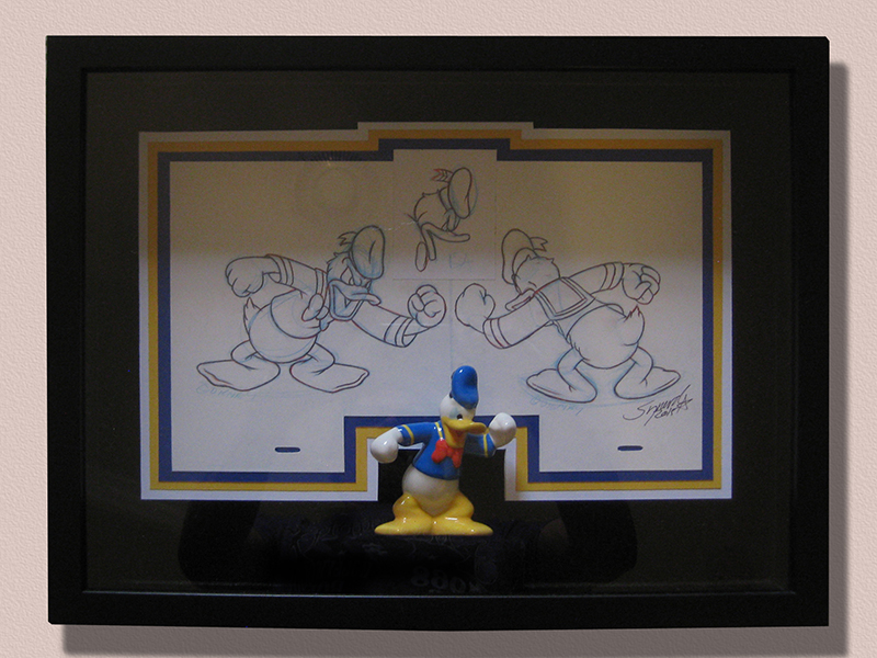 0th Image of a N/A DONALD DUCK FIGURINE AND ARTWORK