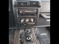 Image 13 of 19 of a 1999 JEEP WRANGLER SPORT