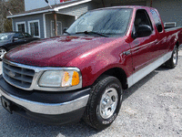Image 4 of 14 of a 2003 FORD F150 XLT