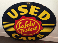 Image 1 of 1 of a N/A SAFETY TESTED USED CARS SIGN