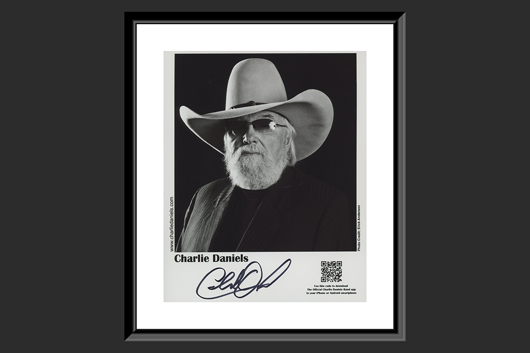 0th Image of a N/A CHARLIE DANIELS SIGNED PHOTO