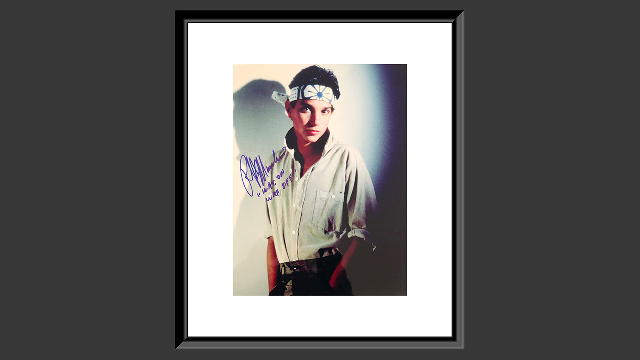 0th Image of a N/A THE KARATE KID RALP MACCHIO SIGNED PHOTO. GFA AUTHENTICATED