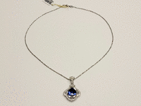 Image 2 of 7 of a N/A 18K WHITE GOLD DIAMOND & TANZANITE