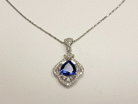 Image 5 of 7 of a N/A 18K WHITE GOLD DIAMOND & TANZANITE