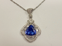 Image 6 of 7 of a N/A 18K WHITE GOLD DIAMOND & TANZANITE